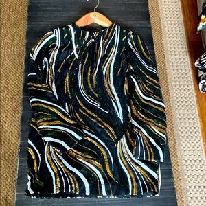 Marciano sequin long sleeve mini dress.